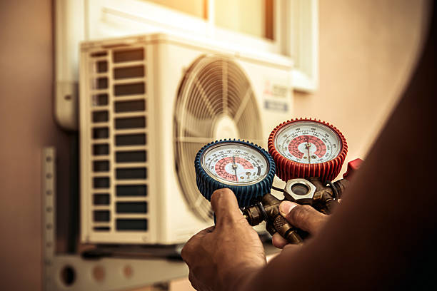 Professional Heat Pump Repair technician working in Luebbering, MO